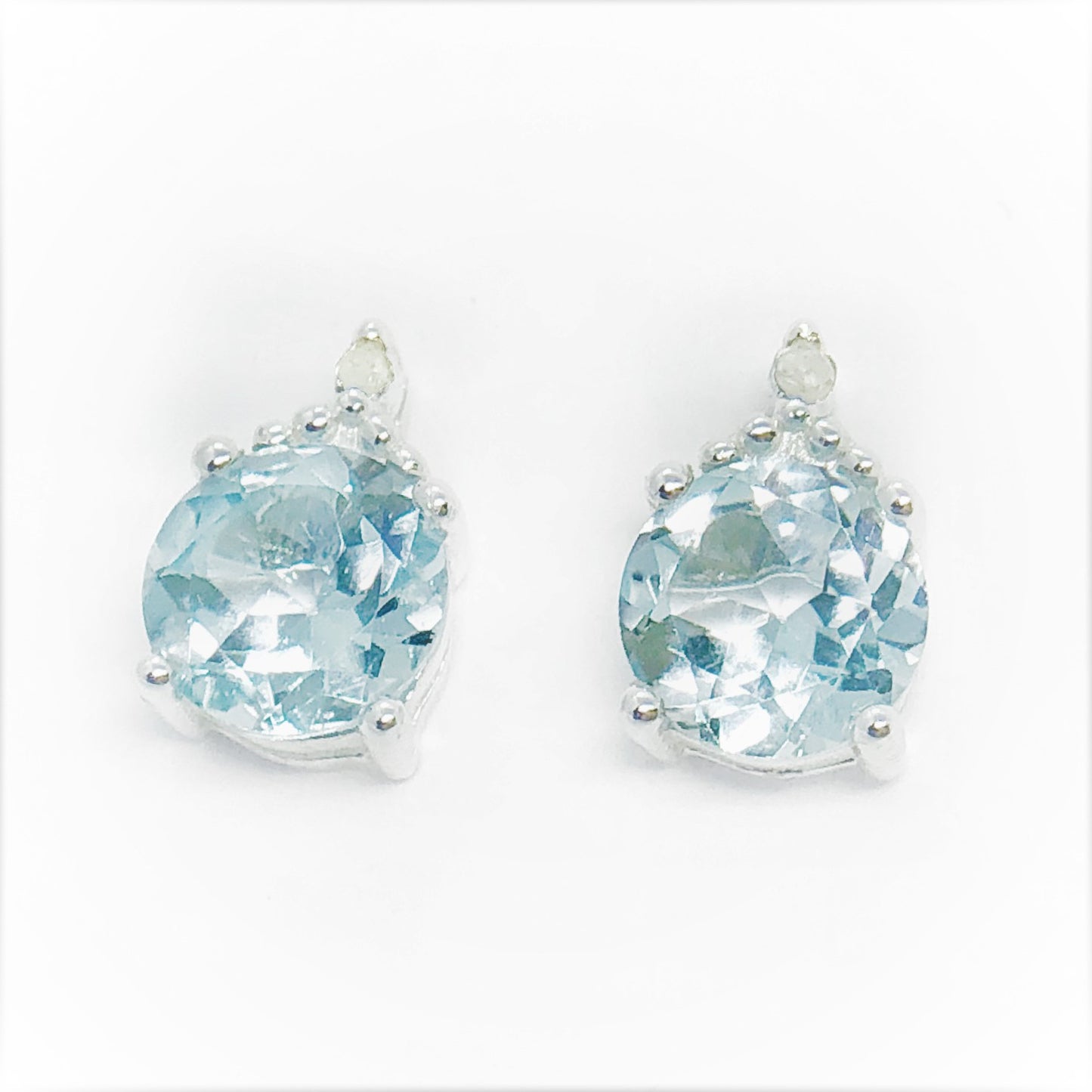 Genuine Blue Topaz & Natural Diamond Accented IOBI Precious Gems Stud 925 Sterling Silver Earrings