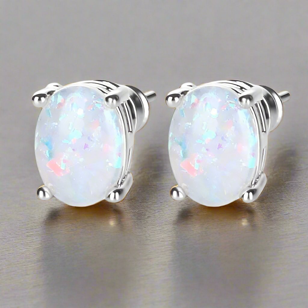 White Simulated Opal Oval Solitaire On 14K White Gold Plated Stud Earrings