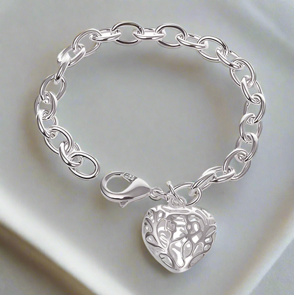 Petite Fancy Silver Puffed Heart Charm 7.5 Inch Adjustable Bracelet for Women Special Occasion Everyday Wear