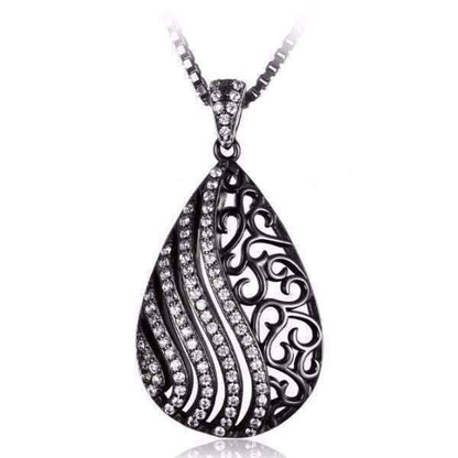 Feshionn IOBI Necklaces Black Ebony Swirl Black Gold Filigree and CZ Pendant Necklace