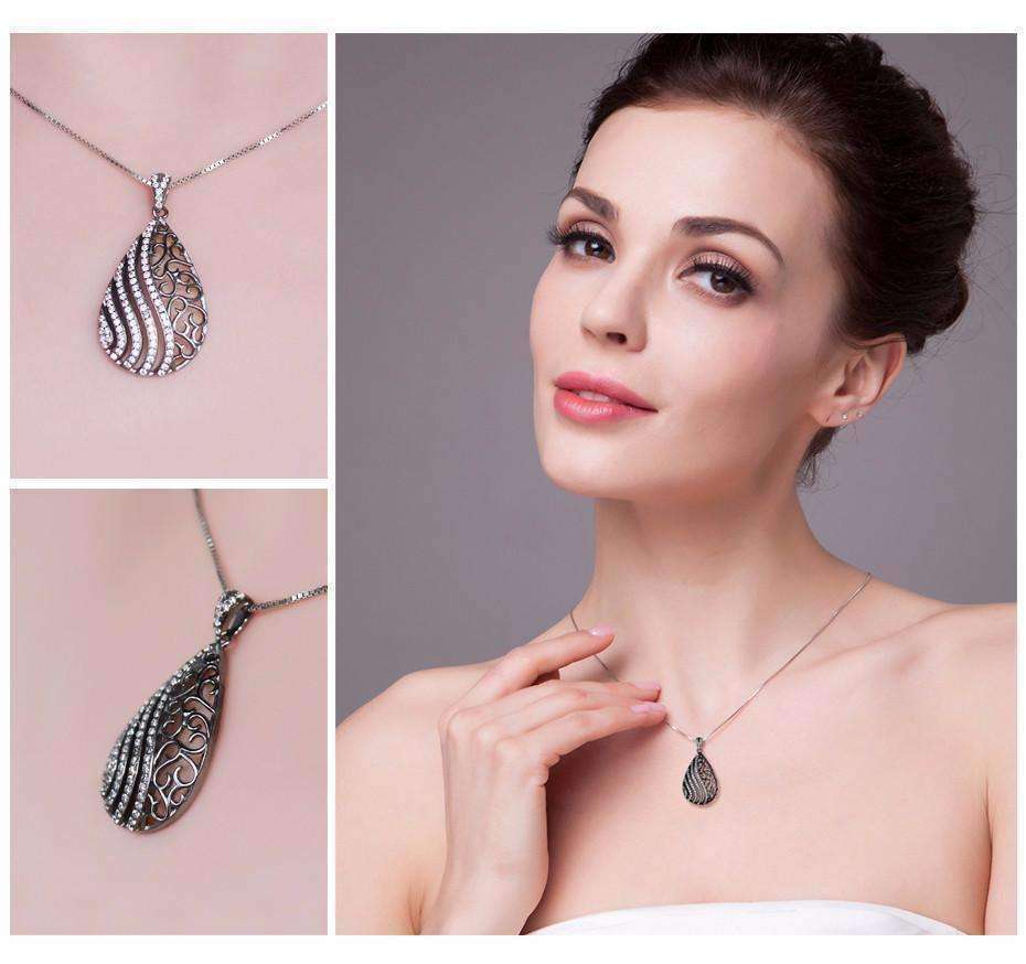 Feshionn IOBI Necklaces Ebony Swirl Black Gold Filigree and CZ Pendant Necklace