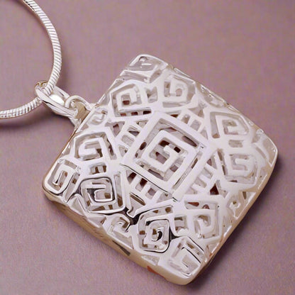 Feshionn IOBI Necklaces Sterling Silver ON SALE - Tribal Pattern Cut-Out Square Cage Sterling Silver Necklace