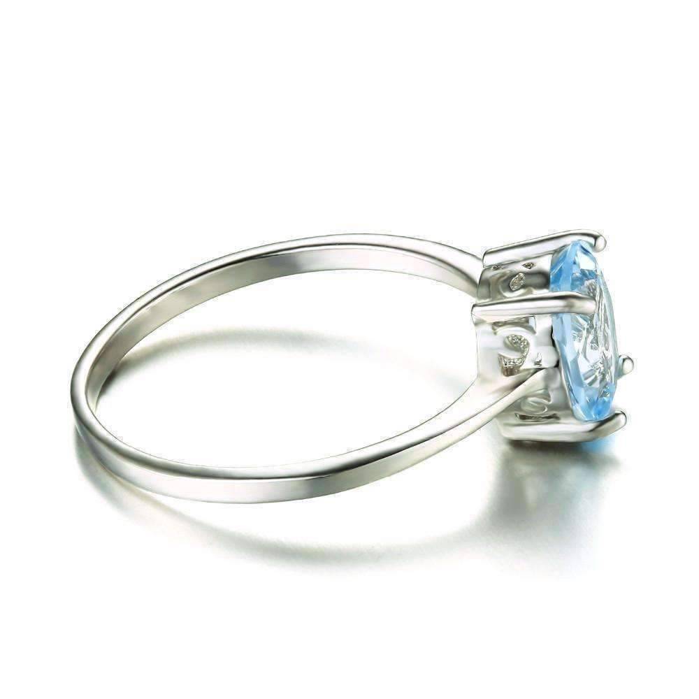 Feshionn IOBI Rings Ice Blue Genuine Topaz Oval Cut 1.5 CT IOBI Precious Gems Ring